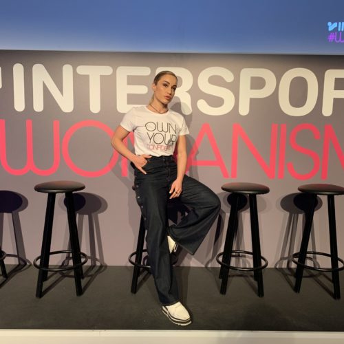 Karolina giving motivational speech at Intersport